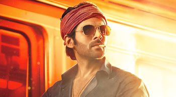 Kartik Aaryan radiates SWAG on a scooter in the TRAILER announcement POSTER of ‘Shehzada’; More details inside!