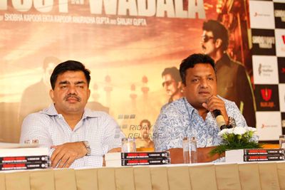 Leads from the film 'Shootout At Wadala' at the press meet with the author Hussain Zaidi