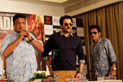 Leads from the film 'Shootout At Wadala' at the press meet with the author Hussain Zaidi