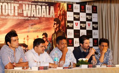 Leads from the film 'Shootout At Wadala' at the press meet with the author Hussain Zaidi