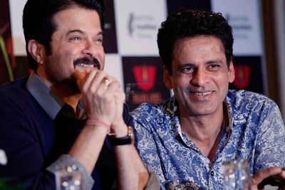 Leads from the film 'Shootout At Wadala' at the press meet with the author Hussain Zaidi