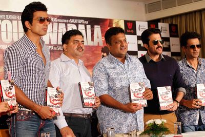 Leads from the film \'Shootout At Wadala\' at the press meet with the author Hussain Zaidi