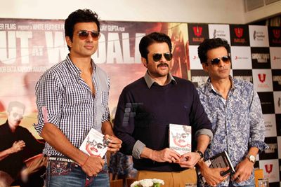 Leads from the film 'Shootout At Wadala' at the press meet with the author Hussain Zaidi