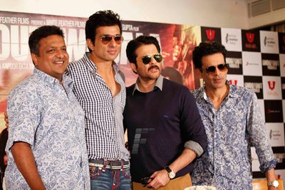 Leads from the film 'Shootout At Wadala' at the press meet with the author Hussain Zaidi