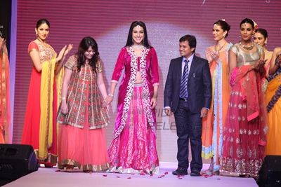 Rituparna Sengupta and Pooja Mishra walk the ramp at the Jewel Trendz show