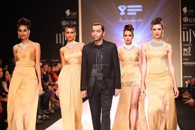 Navneet Kaur and Shobita Dhulipalia walk the ramp for students of IGI