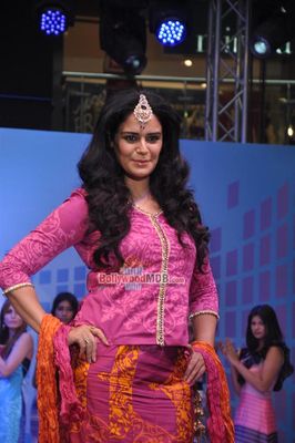 Mona Singh walks the ramp during the launch of Tangerine Home Couture