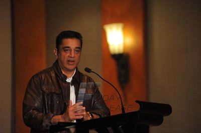 Kamal Haasan and Pooja Kumar at press meet to announce film 'Vishwaroop' premiere tie up with Videocon DTH at Hotel JW Marriott