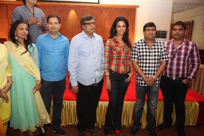 Mallika Sherawat attending the pronouncement press conference of her latest film 'Dirty Politics' with K.C. Bokadia.