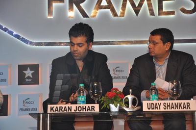 Kamal Haasan and Prosenjit Chatterjee in conversation with Karan Johar at the final day of FICCI FRAMES 2013