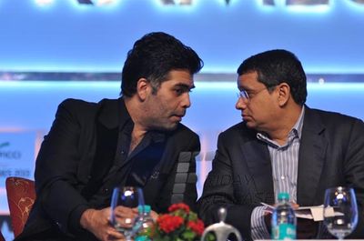 Kamal Haasan and Prosenjit Chatterjee in conversation with Karan Johar at the final day of FICCI FRAMES 2013
