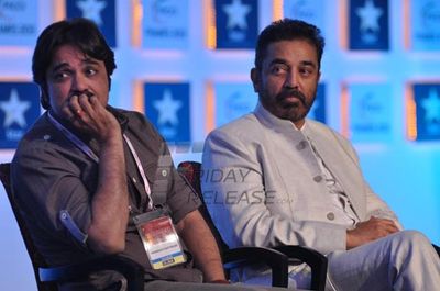 Kamal Haasan and Prosenjit Chatterjee in conversation with Karan Johar at the final day of FICCI FRAMES 2013