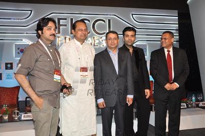 Kamal Haasan and Prosenjit Chatterjee in conversation with Karan Johar at the final day of FICCI FRAMES 2013