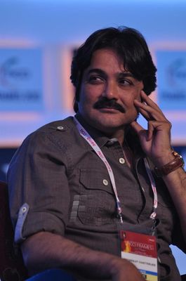 Kamal Haasan and Prosenjit Chatterjee in conversation with Karan Johar at the final day of FICCI FRAMES 2013