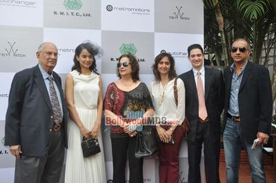 Kangana Ranaut with filmmaker Milan Luthria at the Metro Motors Auto Hangar H M Mehta Trophy 2013