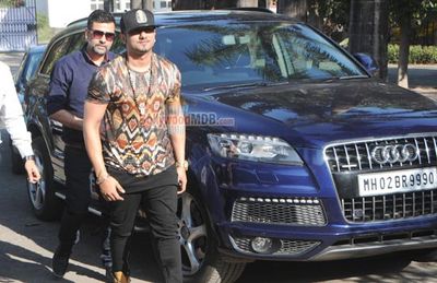 Singer Yo Yo Honey Singh poses with his new Audi Q7 car