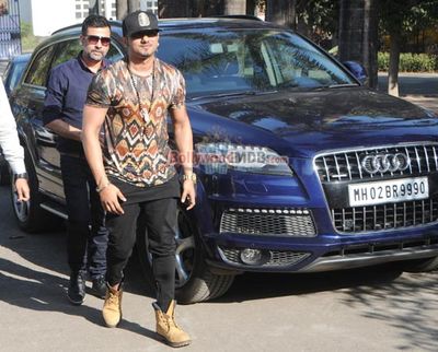 Singer Yo Yo Honey Singh poses with his new Audi Q7 car