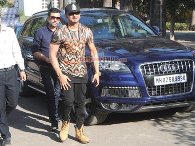 Singer Yo Yo Honey Singh poses with his new Audi Q7 car