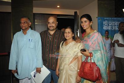 Sonali Kulkarni, Dr Prakash Baba Amte with wife Mandakini Amte at the special screening of Marathi film \'Dr Prakash Baba Amte\'