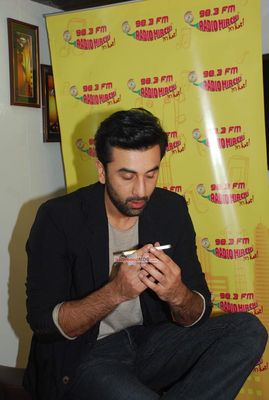 Ranbir Kapoor with RJ Prackriti at film 'Bombay Velvet' promotions at Radio Mirchi FM Studios