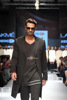 Arjun Rampal showcases a creation by designer Bugatti during Lakme Fashion Week Winter/Festive 2015