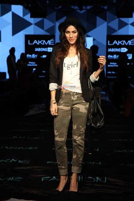 Arjun Rampal showcases a creation by designer Bugatti during Lakme Fashion Week Winter/Festive 2015
