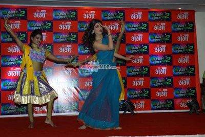 Ravi Kishan and Shinjini Kulkarni perform during the Holi celebration on Big Magic Gana Channel and promotion of his upcoming movie