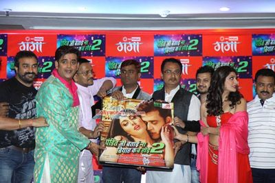 Ravi Kishan and Shinjini Kulkarni perform during the Holi celebration on Big Magic Gana Channel and promotion of his upcoming movie