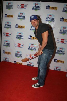 Sohail Khan poses with the winner of 'BIG'est Cricket Fan contest