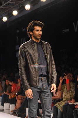 Aditya Roy Kapur and Monica Dogra walk the ramp for fashion designer Tom Tailor at the Lakme Fashion Week Summer/Resort 2015