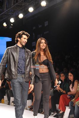 Aditya Roy Kapur and Monica Dogra walk the ramp for fashion designer Tom Tailor at the Lakme Fashion Week Summer/Resort 2015