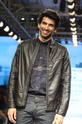 Aditya Roy Kapur and Monica Dogra walk the ramp for fashion designer Tom Tailor at the Lakme Fashion Week Summer/Resort 2015
