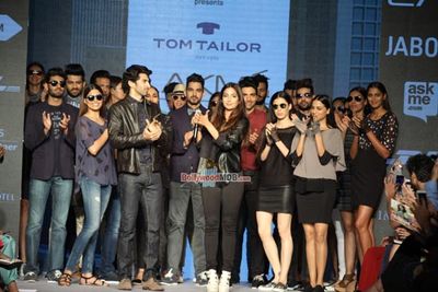 Aditya Roy Kapur and Monica Dogra walk the ramp for fashion designer Tom Tailor at the Lakme Fashion Week Summer/Resort 2015