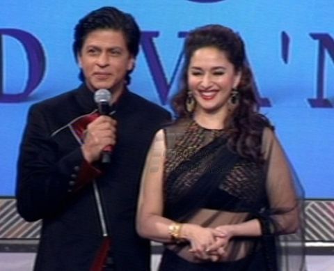 Shah Rukh Khan walks the ramp with Yash Chopra's nine heroines at the tribute on his birth anniversary