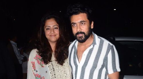Suriya spotted in Mumbai; Paparazzi capture the star outside a restaurant with his wife