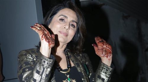 Neetu Kapoor shows her Mehendi to the paparazzi post the wedding; Have a look at the video