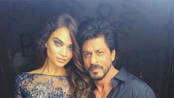 Shah Rukh Khan strikes a pose with Victoria's Secret angel Shanina Shaik in Vogue's latest shoot