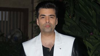 Karan Johar to play a double role in his next?
