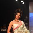 Huma Qureshi & Pooja Kumar walk the ramp for Auro Gold at IIJW 2013