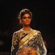 Jacqueline Fernandez walks the ramp for Reliance Jewel Show with Anuj Modi's Couture Collection at LFW Winter Festive 2014
