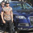 Singer Yo Yo Honey Singh poses with his new Audi Q7 car