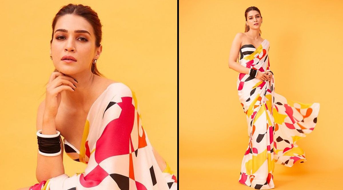 Kriti Sanon chooses a bold vibrant saree by Ranbir Mukherjee as she arrives for Bhediya promotions