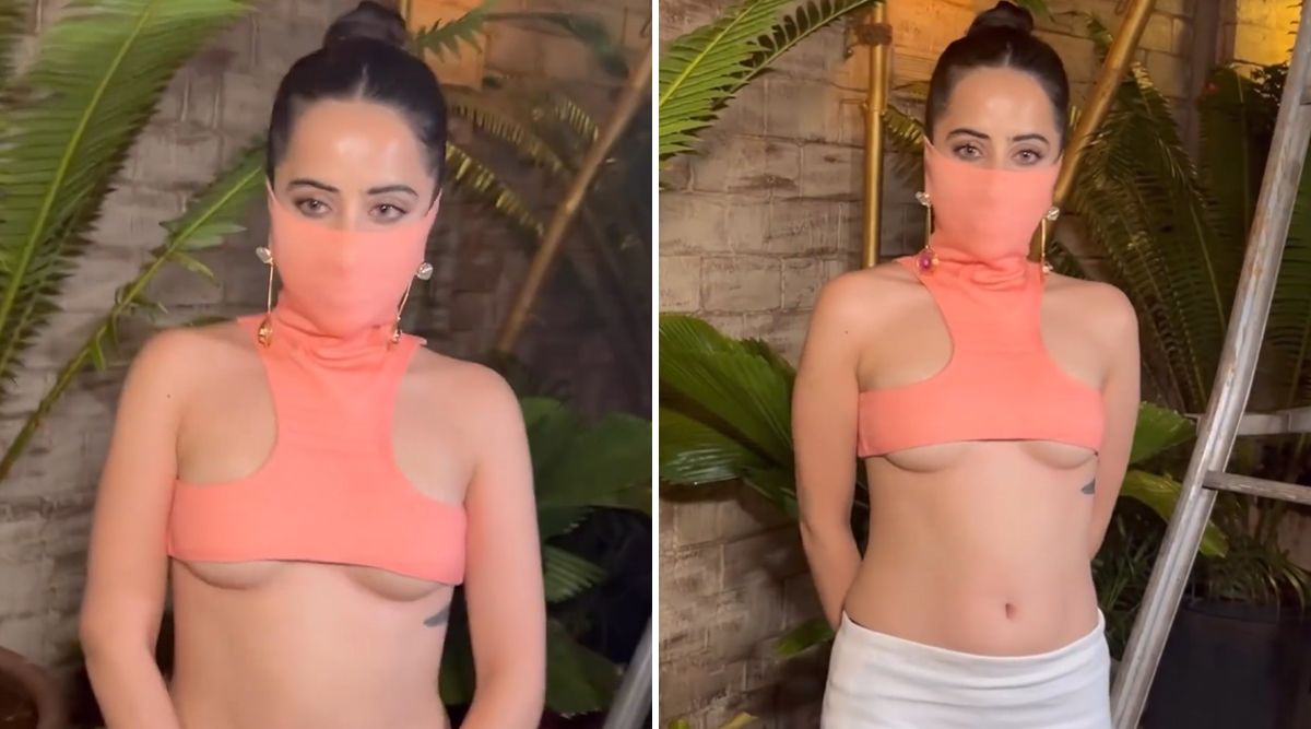 Urfi Javed's Unique Face Mask Style Grabs Attention Once Again; Netizens Troll Her 'Muh Par Kapda Lagwane Ki Jaga Zara Neeche... ' (Watch Video)