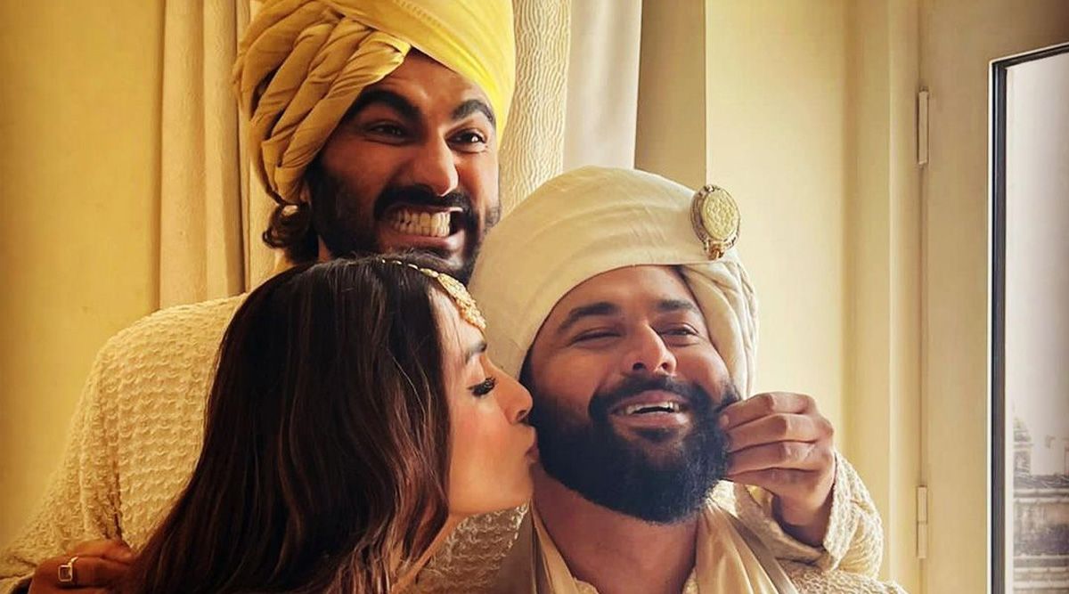 Lovebirds Arjun Kapoor and Malaika Arora pose with groom Kunal Rawal as Shahid Kapoor clicks them