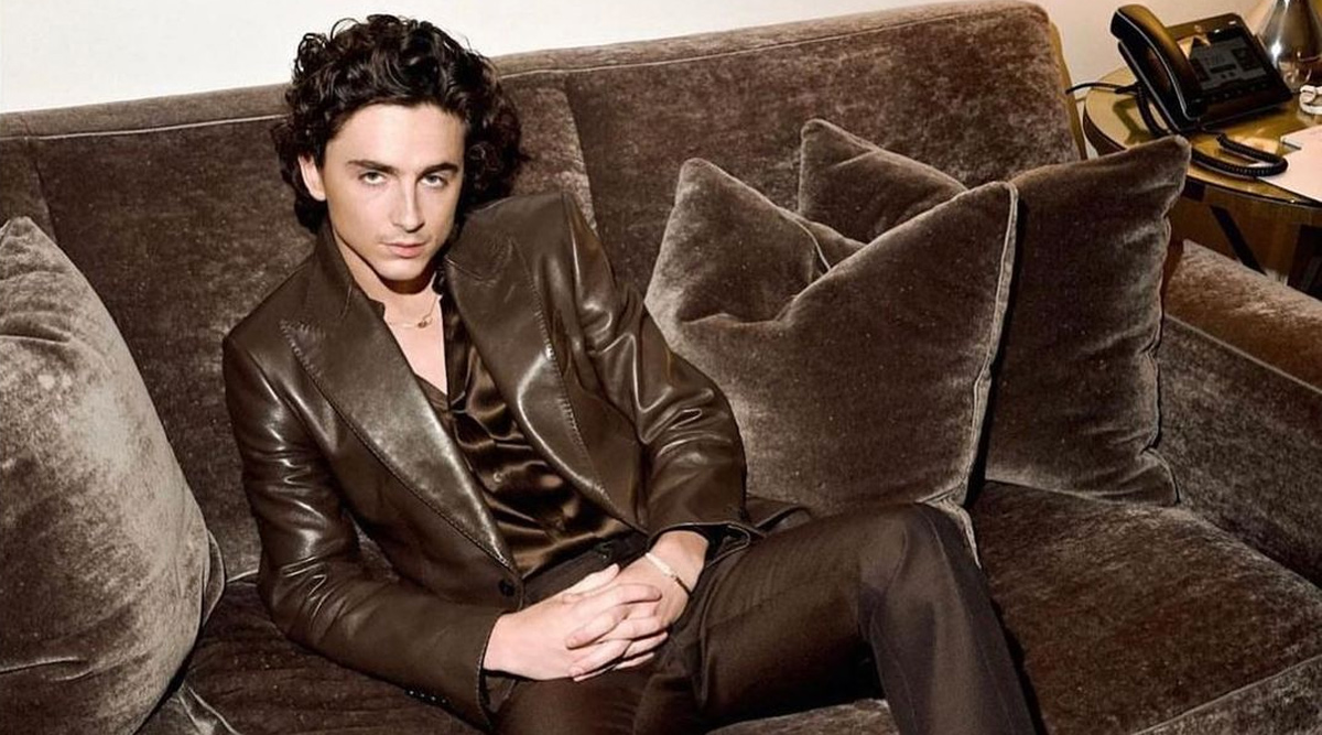 Timothee Chalamet looks sensual but super manly in a brown three-piece suit