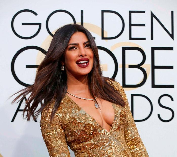 View Pics: Priyanka Chopra’s stunning ‘golden’ avatar at the Golden Globes Awards!